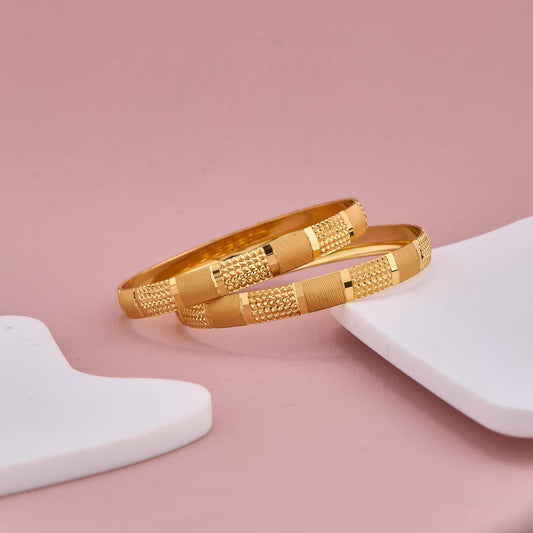 Traditional Yet Modern Gold Bangles with Rich Detailing