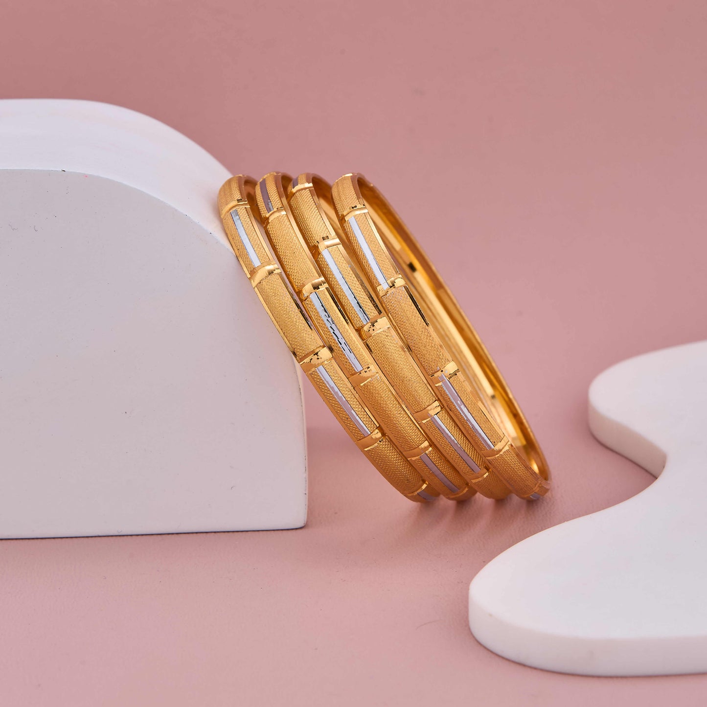 Timeless Gold and Silver Bangles with Contemporary Highlights