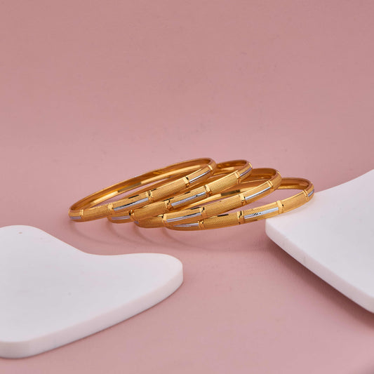 Timeless Gold and Silver Bangles with Contemporary Highlights