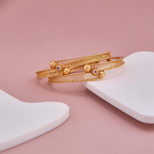 Regal Grace Bangles with Golden Net Detailing and Sparkling Accents