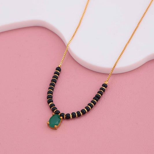 Timeless Harmony Black Beads & Green Stone