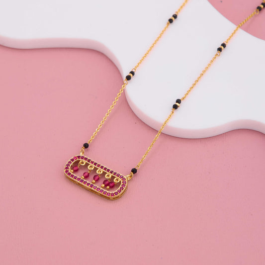 Modern Gold Plated Mangalsutra with Maroon Pendant Design