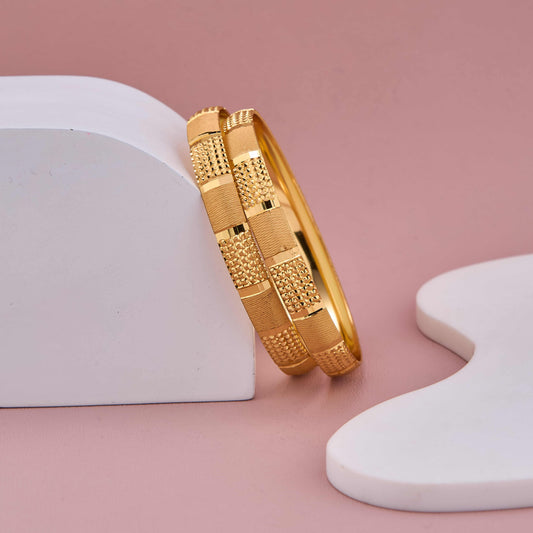 Traditional Yet Modern Gold Bangles with Rich Detailing