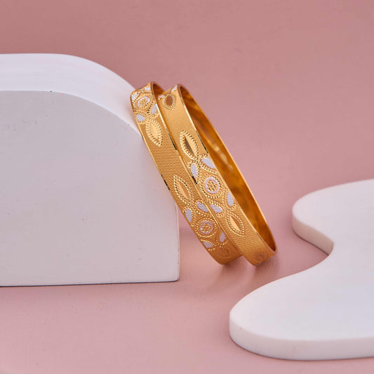 Traditional Gold Bangles with Silver Floral Accents