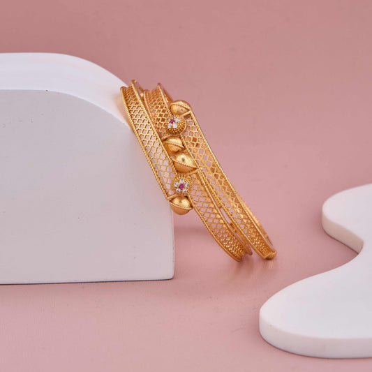 Regal Grace Bangles with Golden Net Detailing and Sparkling Accents