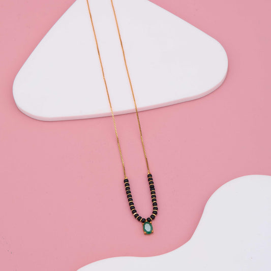 Timeless Harmony Black Beads & Green Stone